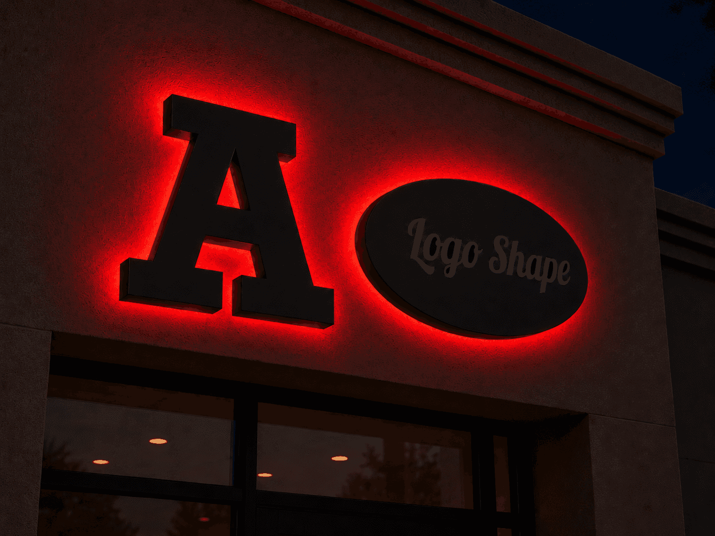 Halo-lit channel letters and logo shape sign illuminated at night