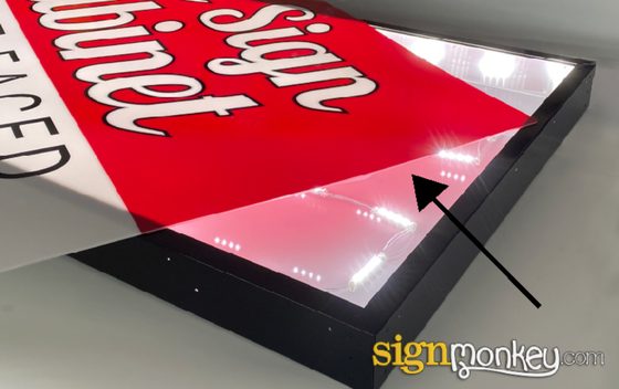 Polycarbonate face for an illuminated sign