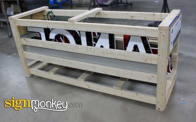 SignMonkey freight shipping crate packed with a finished custom sign
