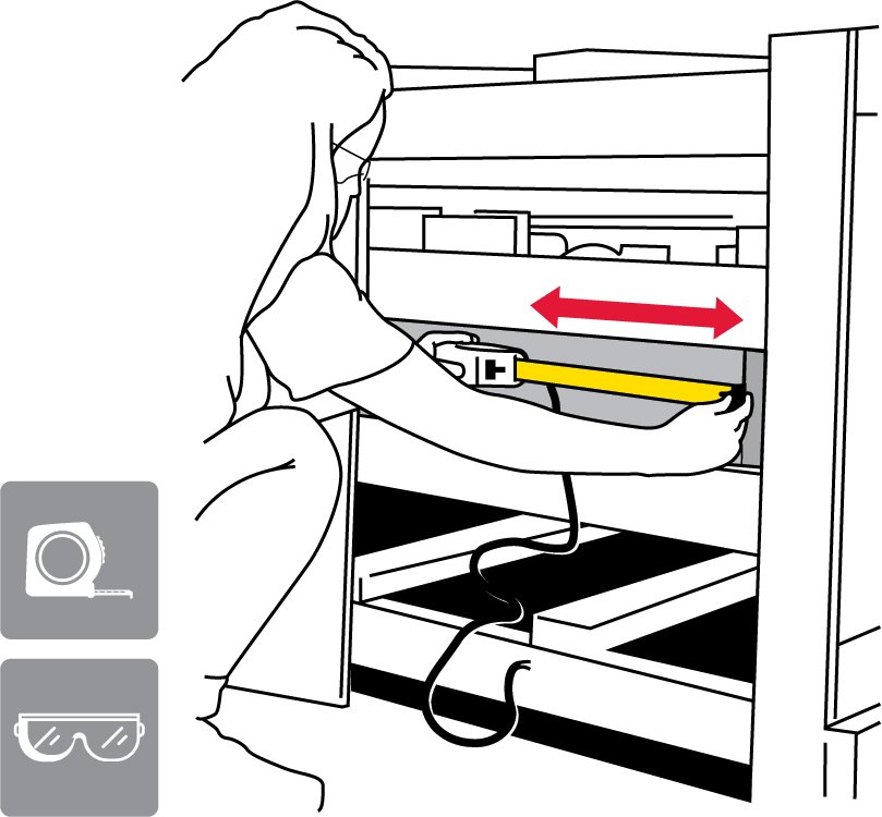 Tape measure showing raceway power hole location from the end and top flange