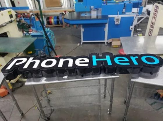Cloud sign shaped around a logo