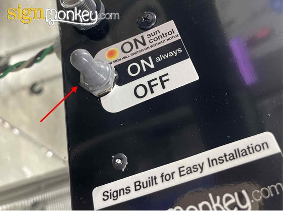 Snap switch for sign controls