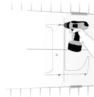 Installer drilling marked mounting holes for EZLit channel letters through the paper pattern